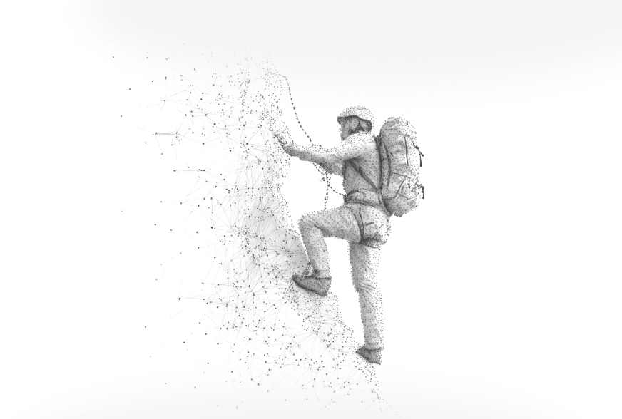 A climber on a steep, storm-swept slope