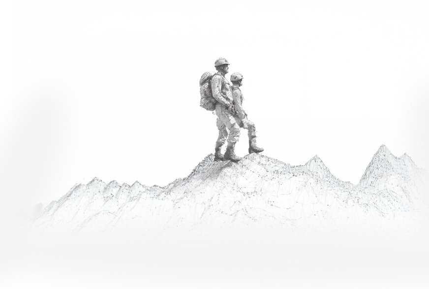 A climber at the summit above the clouds